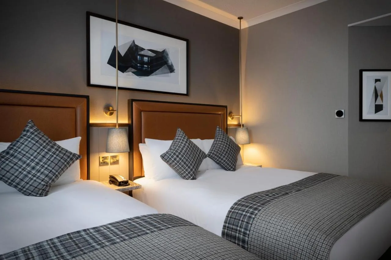Hotel room with two beds and lamps near Jeffrey Street, Edinburgh
