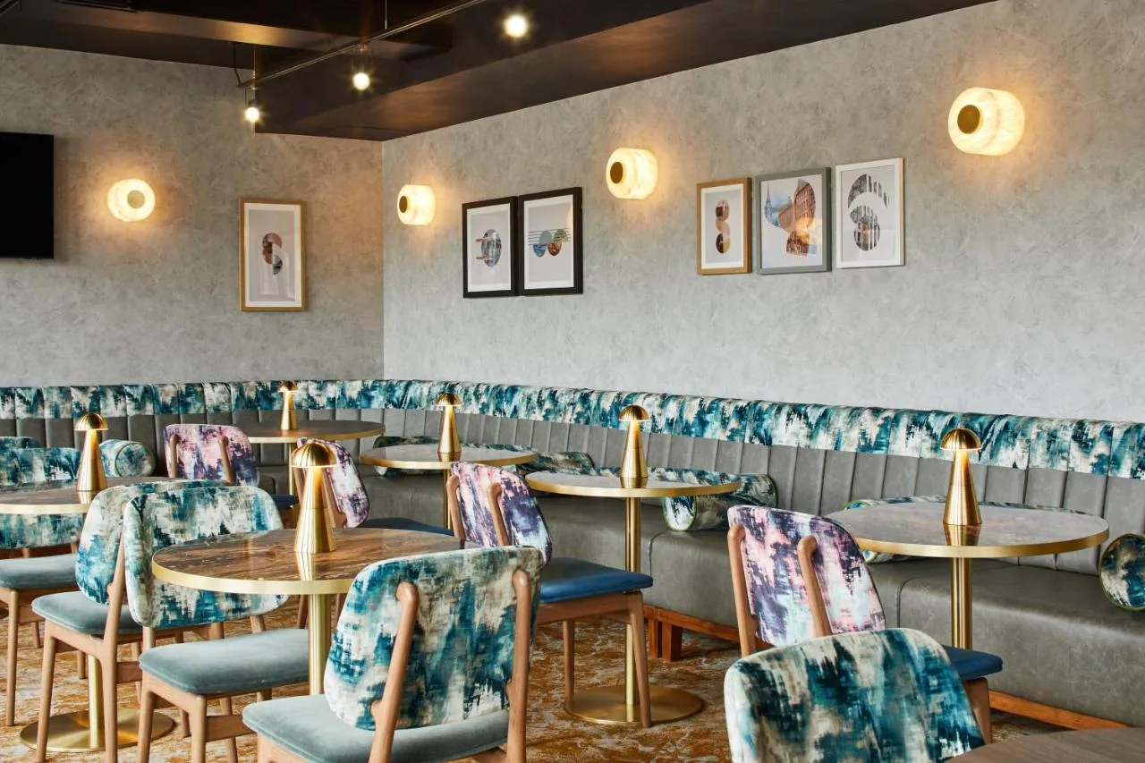 Row of tables and chairs in the hotel restaurant